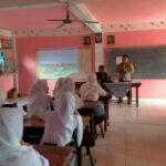 Tanamkan Kedisiplinan Sejak Dini, Polsek Muncar Beri Materi MPLS di MA Miftahul Huda Wringinputih Screenshot_20260714-203355